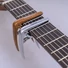 Kép 2/3 - Guitto - GGC-04 Wood klasszikus gitár capo, famintás